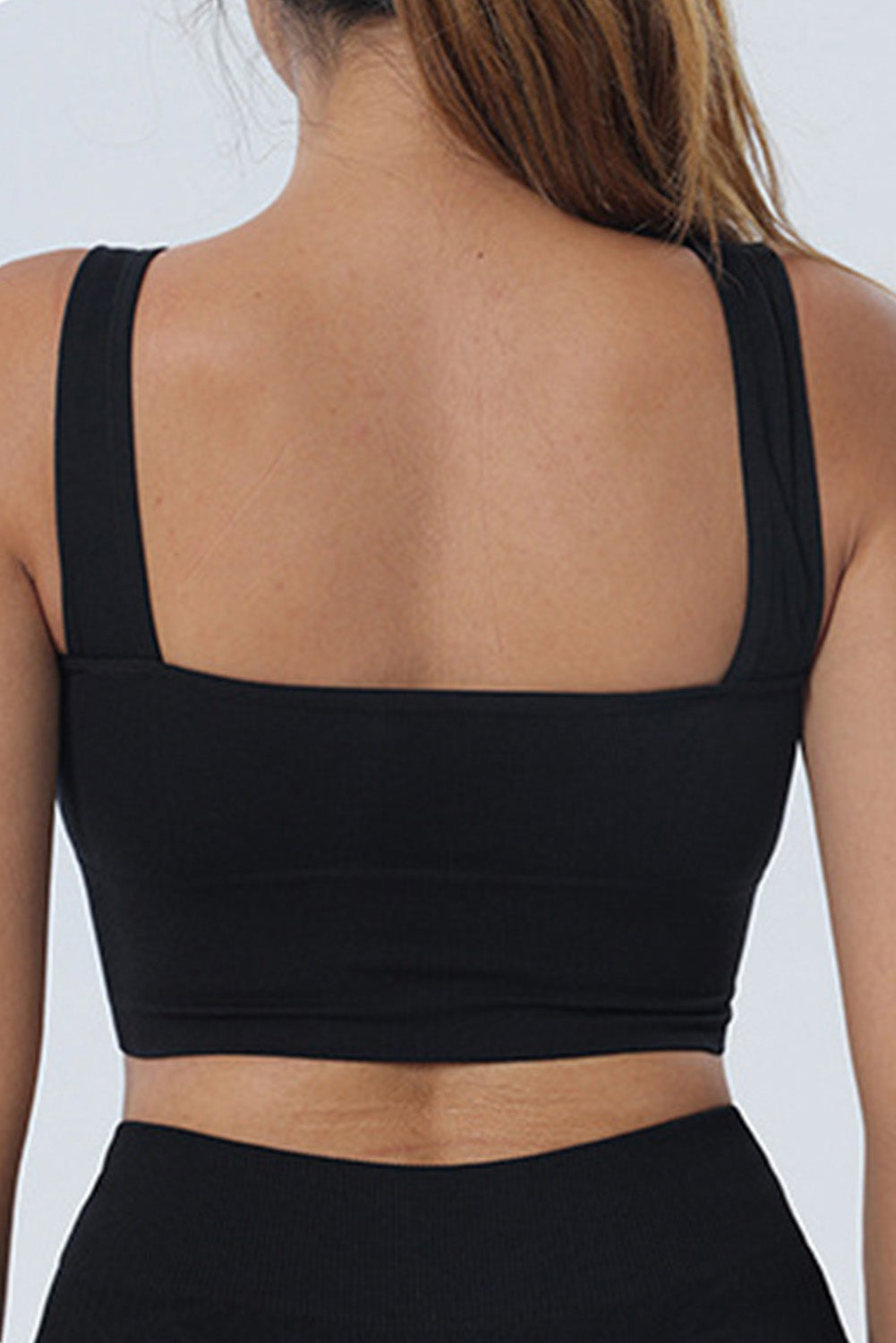 Top de yoga noir sans couture à encolure en U et sans manches, coupé court