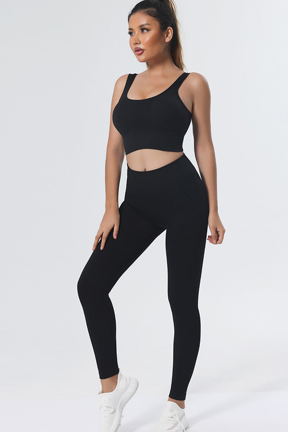 Top de yoga noir sans couture à encolure en U et sans manches, coupé court