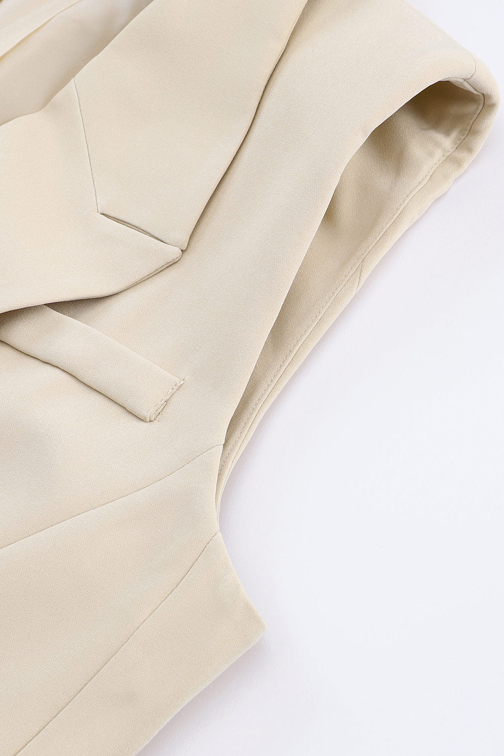 Veste blazer abricot à col à revers, poches et bouton unique