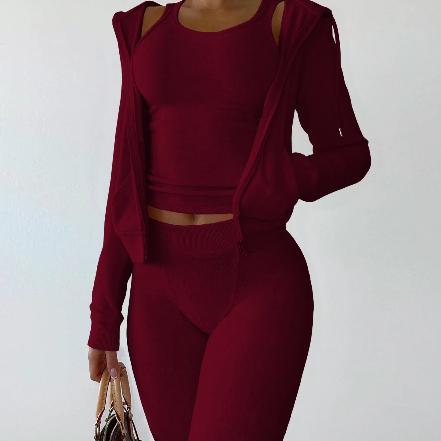 Ensemble trois pièces avec gilet à capuche
