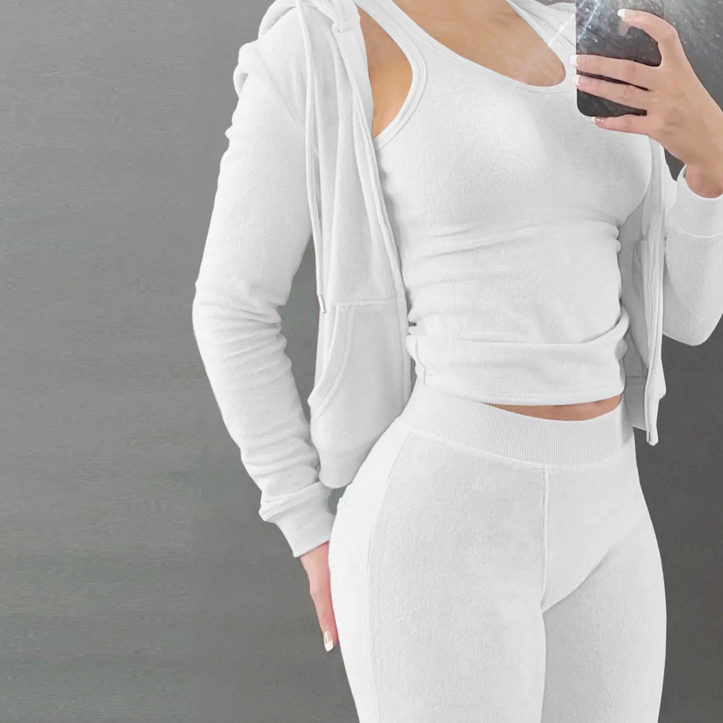 Ensemble trois pièces avec gilet à capuche