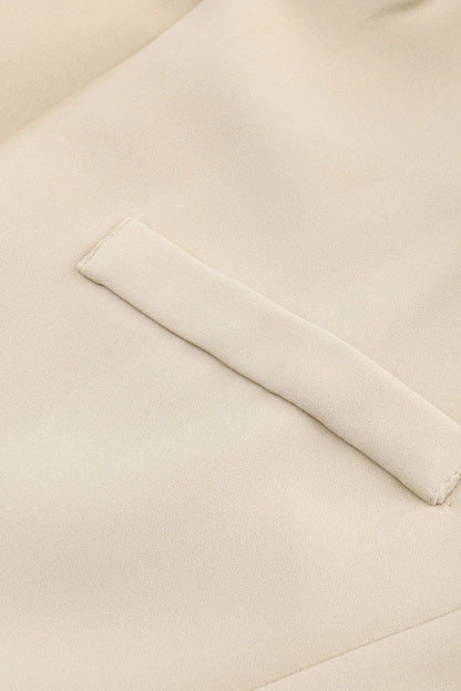 Veste blazer abricot à col à revers, poches et bouton unique