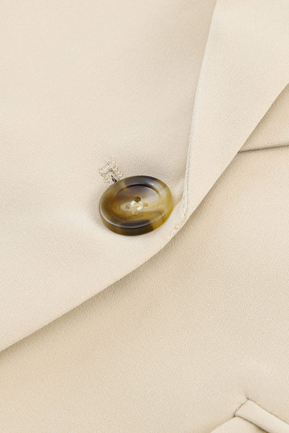 Veste blazer abricot à col à revers, poches et bouton unique