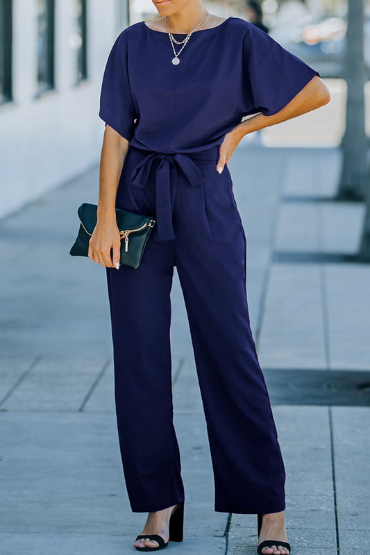 Combinaison bleue à jambes larges ceinturée